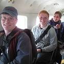 Bob, Kelsey, Jenny on an airplane.
